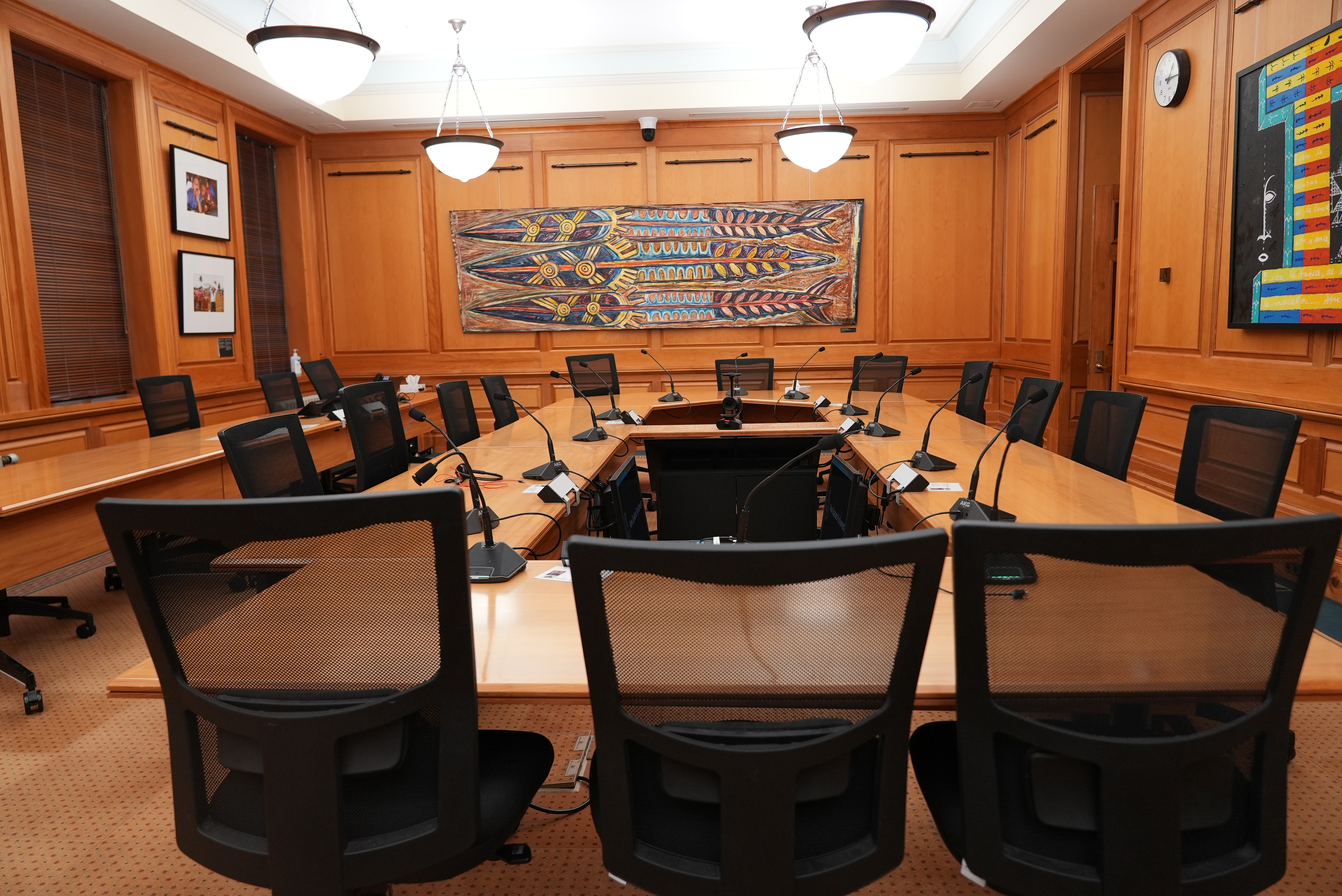 photo of a meeting room with wood panelling, Pasifica artwork and a meeting table